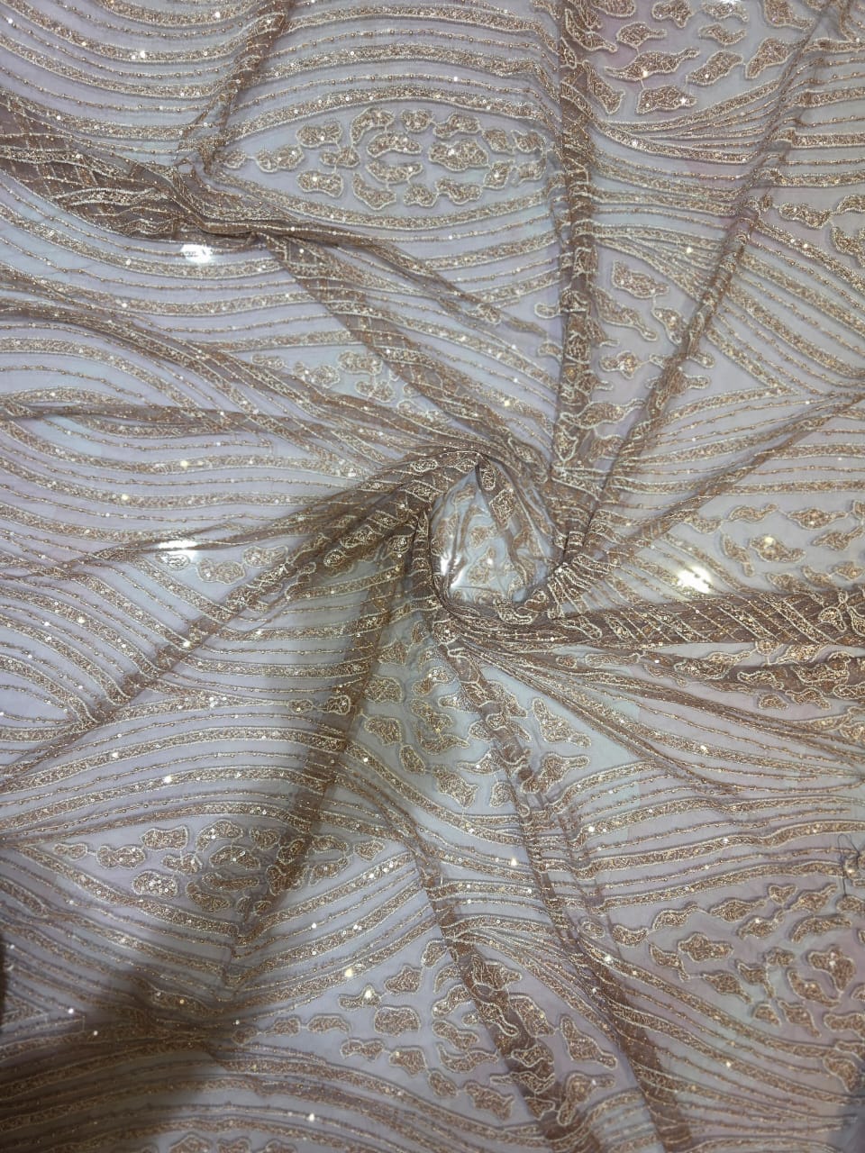 Imported cut dana shimmer running fabric