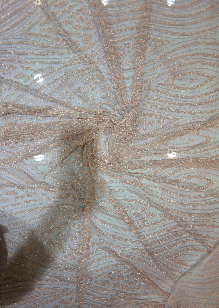 Imported cut dana shimmer running fabric