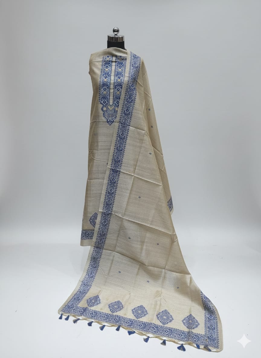 Beige colour unstitched tussar silk suit with blue colour thread weaving